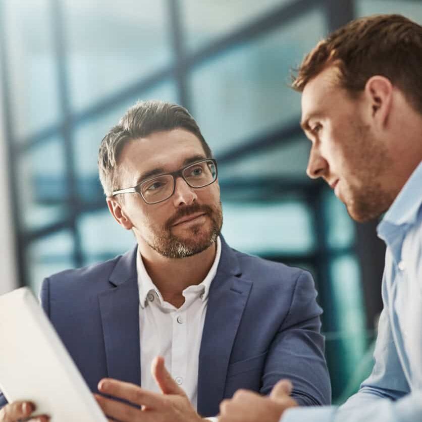 Cropped shot of two businessmen meeting in the office